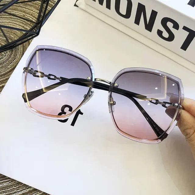 Gafas de sol cuadradas sin montura de moda para mujer