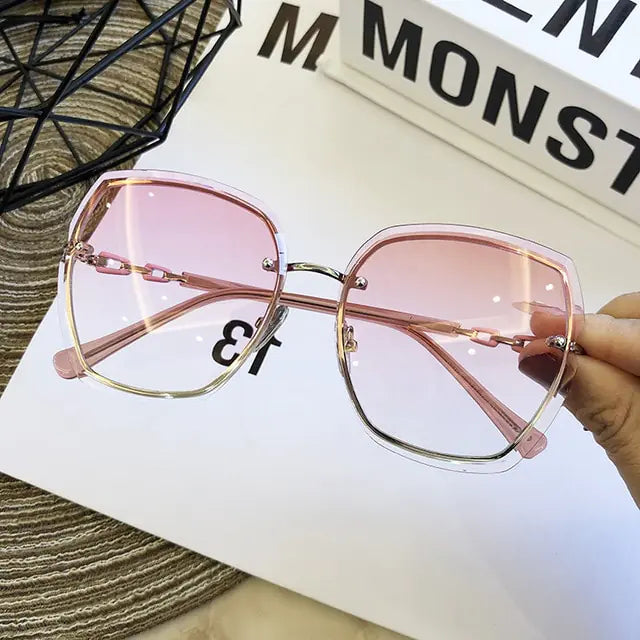 Gafas de sol cuadradas sin montura de moda para mujer