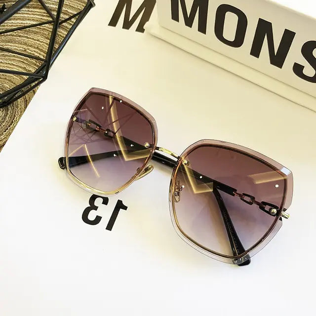 Gafas de sol cuadradas sin montura de moda para mujer