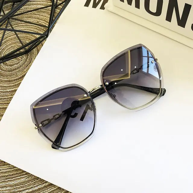 Gafas de sol cuadradas sin montura de moda para mujer